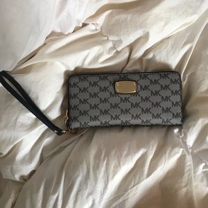 Black and gray Michael Kors wallet